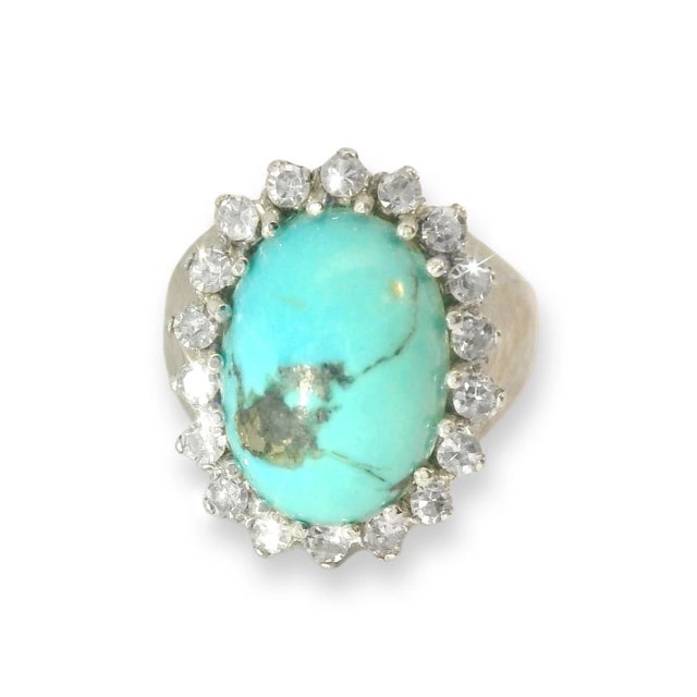 18K White Gold Handmade Turquoise & Diamond Cocktail Ring. This striking ring features one natural turquoise cabochon (12...