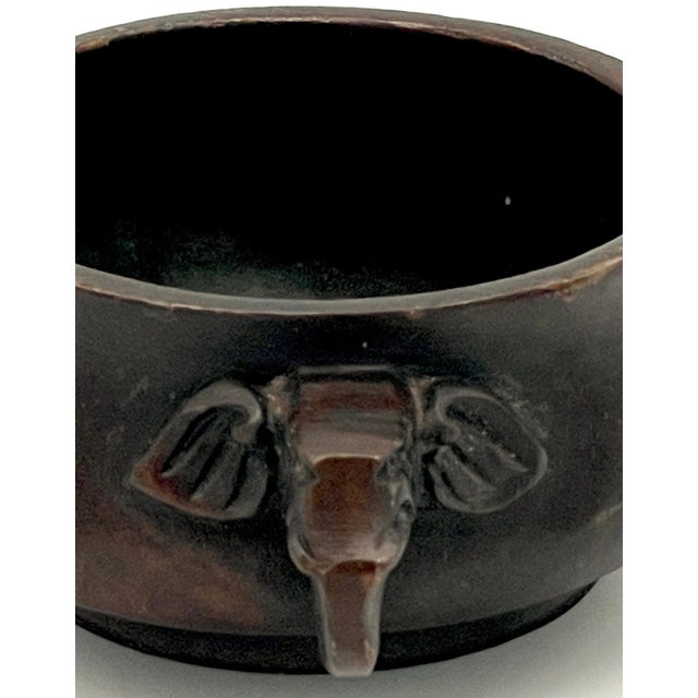 Chinese Bronze Diminutive Elephant-Handled Bronze Censor, Signed and Carved Wood Stand, 20th century or older This...