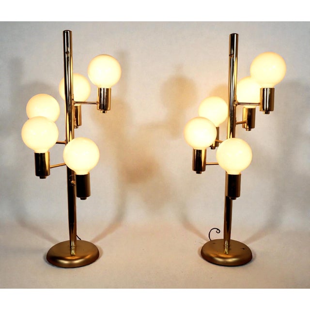 Very stylish pair of retro 5 globe table lamps designed in the style of Robert Sonneman. These are in good fully working...