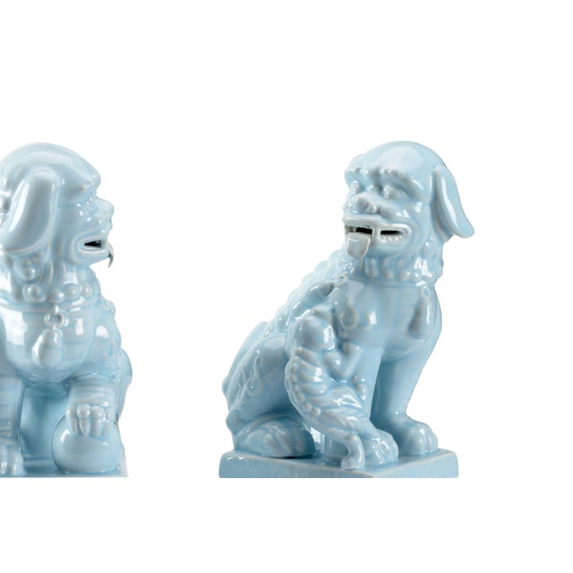 Known as guardians of the palace, foo dogs or Chinese guardian lions ward off evil and symbolize prosperity for the...