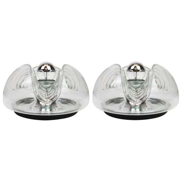 A special round biomorphic clear glass wall sconce or flush mount designed by koch & lowy for peill & putzler,...