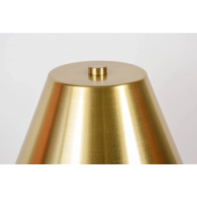 This pair of table lamps was designed by Angelo Brotto. Up to 250V (Europe/UK Standard).The wiring of this item may be...