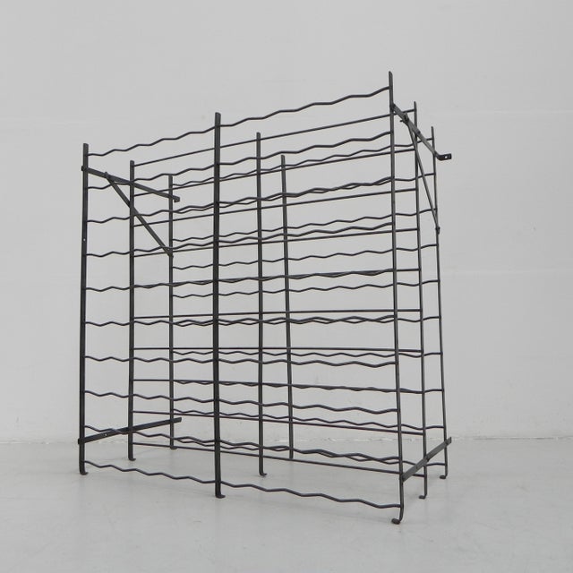 Height: 103 cm. Width: 100 cm. Depth: 44 cm. Origin: France, 1950s. Material: steel.