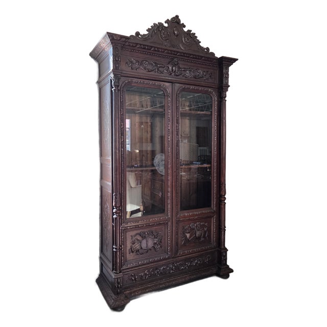Gorgeous 19th Century French Carved Oak Bookcase With Turned Supports and Decorative Frieze For Sale