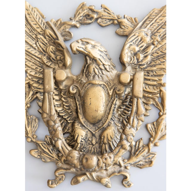 A fine large antique American Federal eagle brass door knocker, circa 1900. This regal door knocker is nicely cast and...