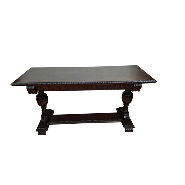 Beautiful Tudor design mahogany console table by Imperial Grand Rapids furniture company. Top has been beautifully...