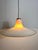 A stunning Murano glass ceiling lamp from Italy, dating back to the 1960s. This exquisite piece features a unique hat-...