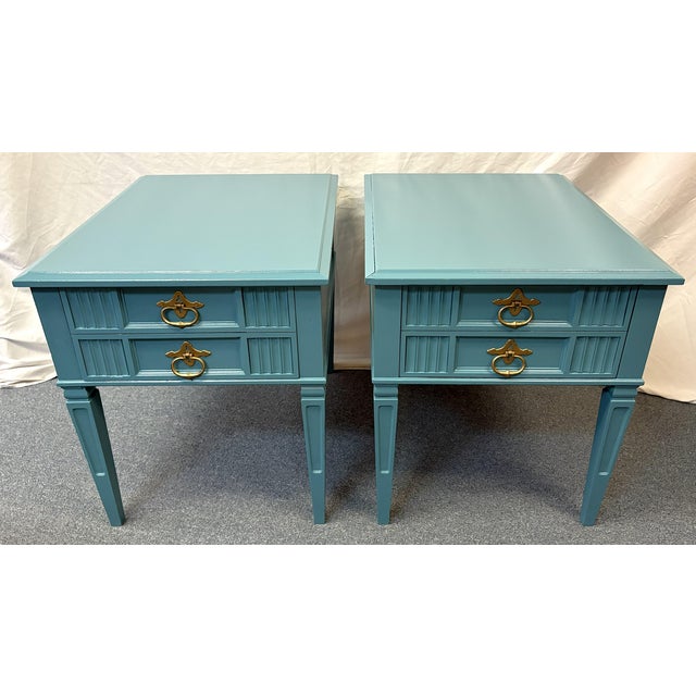 Great pair of vintage end tables by Heritage Furniture. They are beautifully crafted of solid wood with tapered legs and...