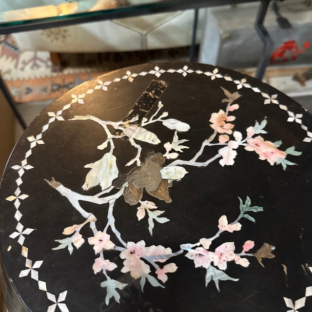 Up for consideration is a beautiful vintage Asian style black wooden plant stand with mother of pearl accents. This would...