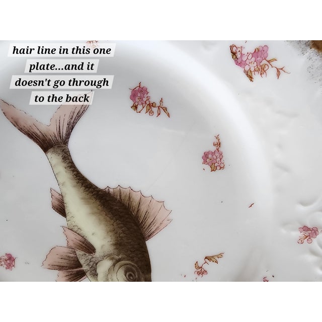Beautiful antique Austrian porcelain fish set consists of 8 plates and one platter. The plates measure 9" each and the...