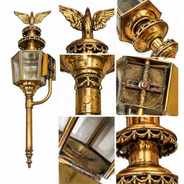 The carriage lamp is embellished with decorative crown elements and crowned with an impressive eagle ornament. Original...