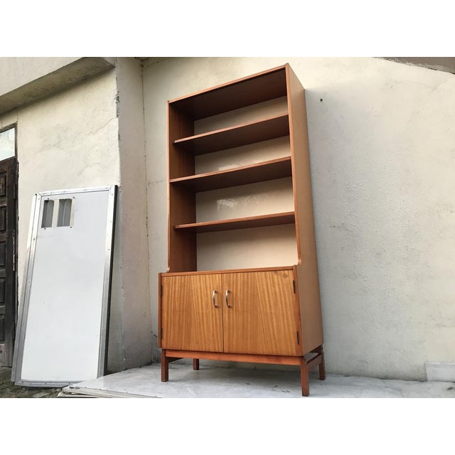 Bookcase-Library made of furniture board with natural wooden veneer, 1970s. The furniture comes from the Polish Factory...