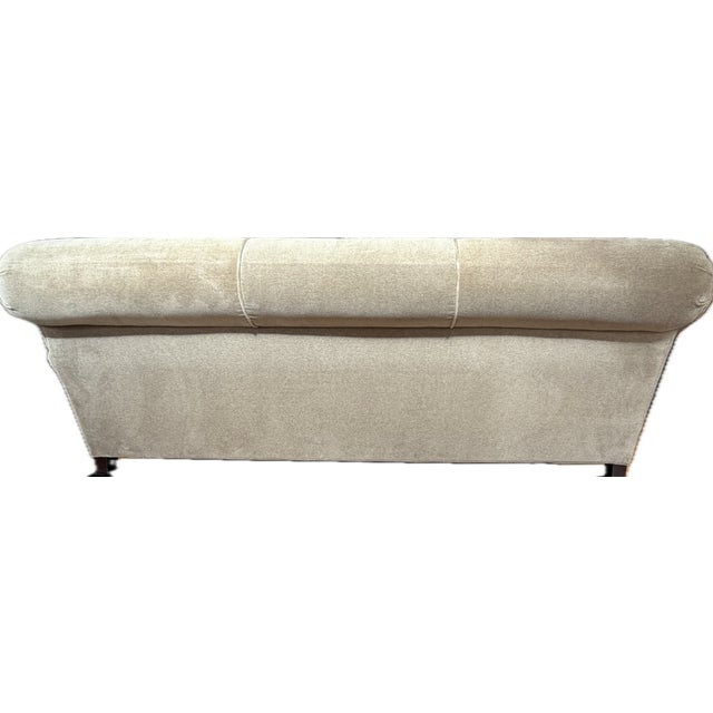 Custom English Roll Arm Sofa Upholstered in Performance Mushroom Taupe Velvet by Restoration Hardware This silhouette...