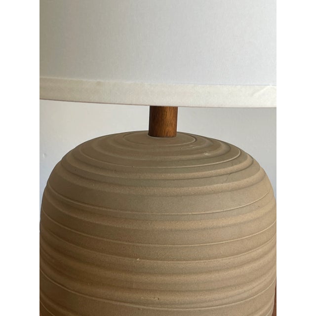 Unusual ceramic table lamp by famed ceramicist duo Jane and Gordon Martz for Marshall Studios. Features a seemingly...