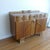 Measures 54" wide, 19" deep, 39.5" highest spot on back trim, 36.5" to the top of buffet. Three dove-tailed drawers,...