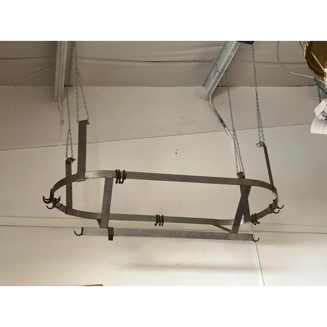 Large Stainless Steel Pot Holder. Can be reversed. The base is 14 inches high 25 inches wide and 60 inches long. There are...