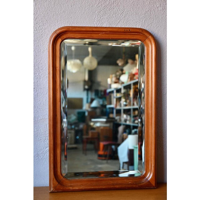 This exquisite mirror embodies the purest Louis-Philippe style, with its gently rounded upper corners and clean, straight...