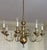 Large eight light brass chandelier in the Dutch Queen Anne style. Graceful proportions - hangs 44" from the ceiling;...