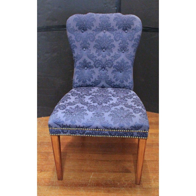 Circa 1920 Georgian style set of four side chairs. Upholstered backs and seats. Raised on square, tapered front legs with...