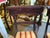 Pair of 19th Century English Regency wood chairs. Carved turned legs, carved detail. Upholstered seats. Legs are a bit...