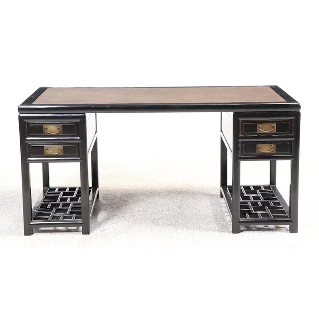 This is a beautiful 19th-century Chinese black lacquered travel desk with two yolk-back chairs. The desk features gilded...