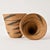 The Tutsi Tight Weave Basket with Lid from Rwanda epitomizes the artistry and tradition of the Tutsi community's weaving...