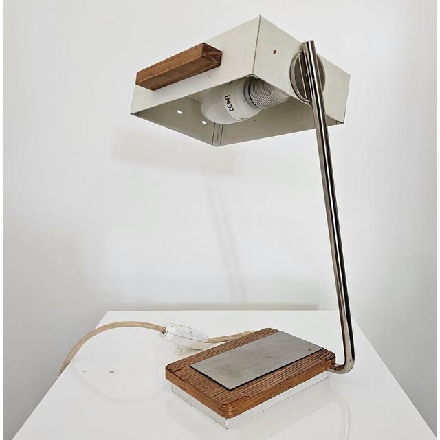 Kaiser Desk Lamp Model 45110/012 Product information Original Kaiser table lamp from the 1960s with teak base and rotating...