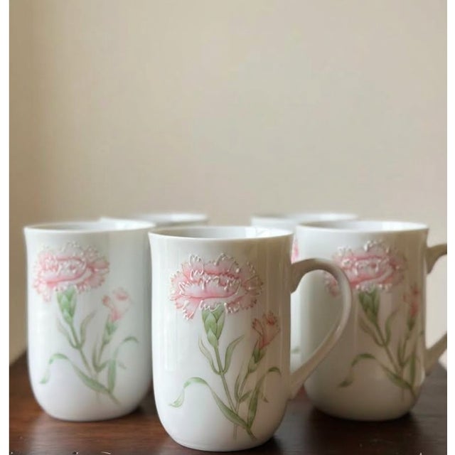 Enhance your morning coffee or tea ritual with this beautiful set of five (5) vintage porcelain mugs manufactured by the...