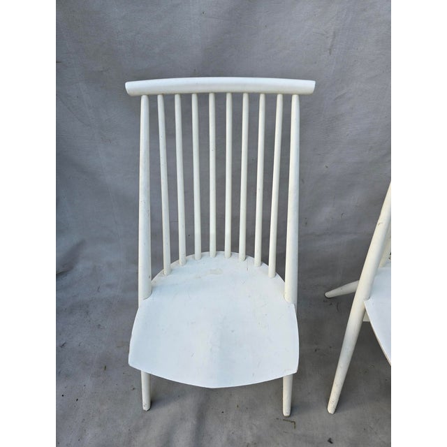 This pair of chairs are in a scandinavian design and often referred to as Mademoiselle. I cant guarantee this because...