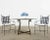 Iconic mid-century modern set of four patio and garden dining armchairs made in the style and manner of Mario Papperzini...