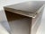 A signed Pierre Cardin bar cabinet on castors. Some vintage wear. The chrome band on one end has some scuff scratches...