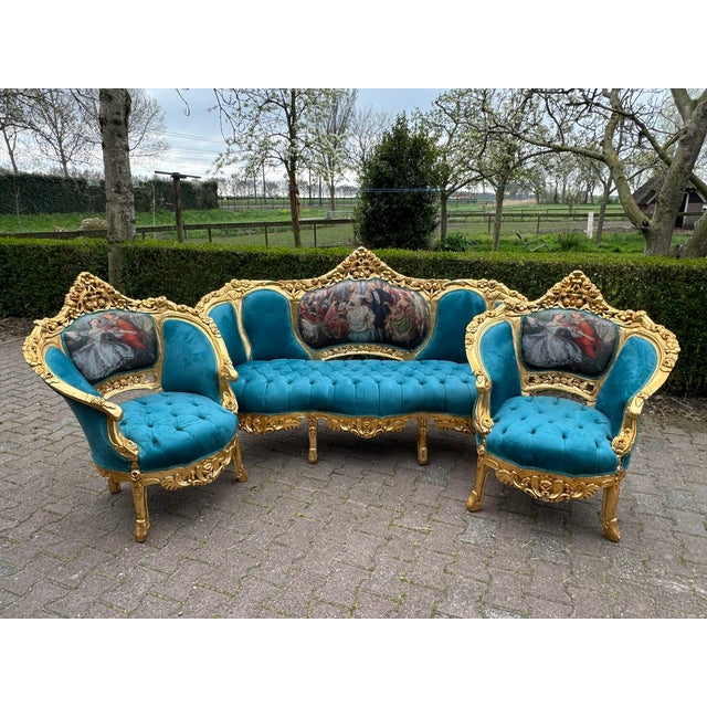 This elegant early 1900s French Louis XVI–style salon set consists of one substantial corbeille sofa and two matching...