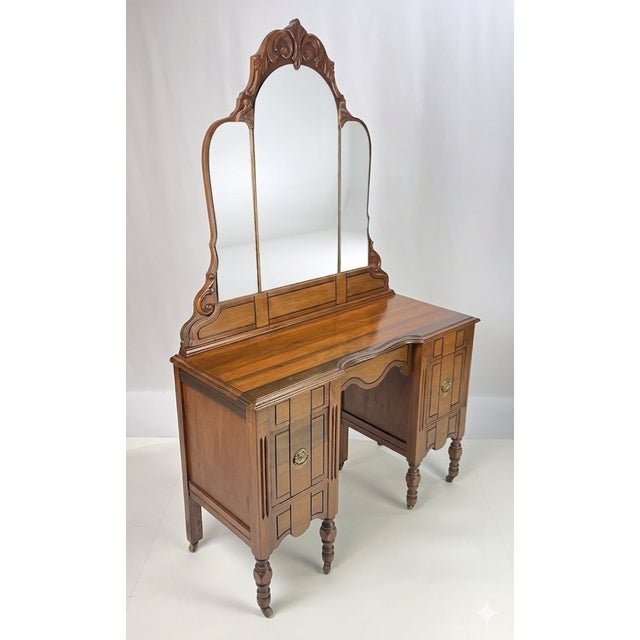 Depression era vanity that would make an elegant addition to any bedroom or dressing suite. This piece balances Art Deco...
