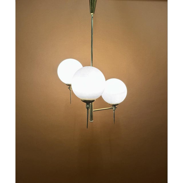 Chandelier from Maison Lunel, France, 1950s, in Very Good conditions. Designed 1950 to 1959 I have official proof of...