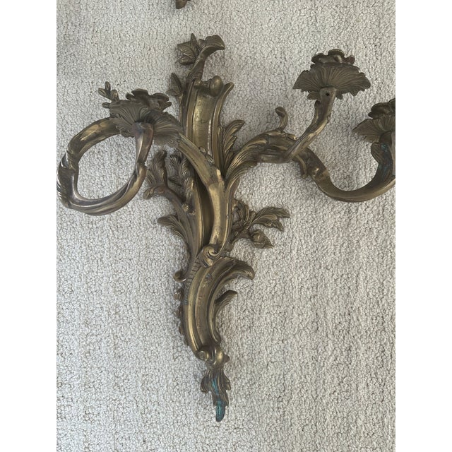 Bring timeless French elegance to any interior with a striking pair of rococo revival three – arm wall sconces. Richly...