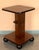 Italian Art Deco octogonal side table, circa 1930s. Narrow ebonized feet and round finial at center base set off the...