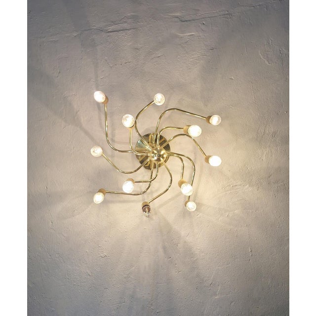 Spiral shaped brass chandelier / ceiling light with 12 lights on 3 levels. Dates from 1960s-70s. Up to 250V (Europe/UK...