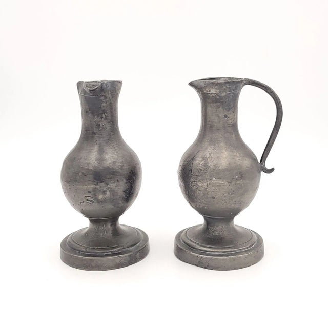A pair of pewter pitchers, France circa 1800.