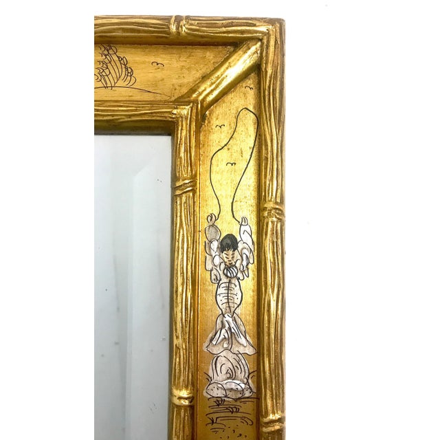 Elegant Chinoiserie La Barge style wall mirror framed in gold / gilt faux bamboo with delightful miniature hand painted...