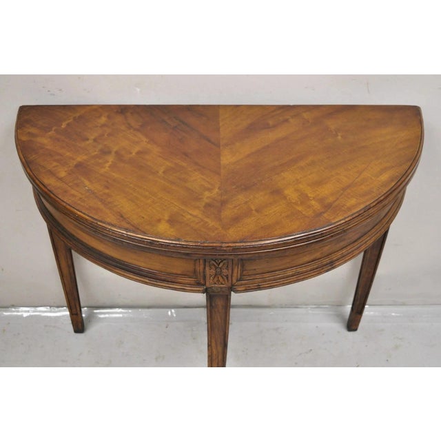 Antique Mahogany Demilune Flip Top Console Game Table with Hidden Drawer. Item features hidden pull out rear drawer with...