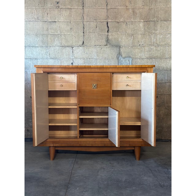 Stylish French Art Deco period cabinet. Gorgeous beech veneers over a solid wood frame, with great proportions and ample...