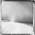 Frozen beach' neringa, lithuania 2023 a photograph captured with a polaroid camera that showcases the winter landscape of...