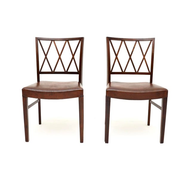 An outstanding pair of vintage Danish chairs by Ole Wanscher, dating from the 1960’s. They are of amazing quality and have...