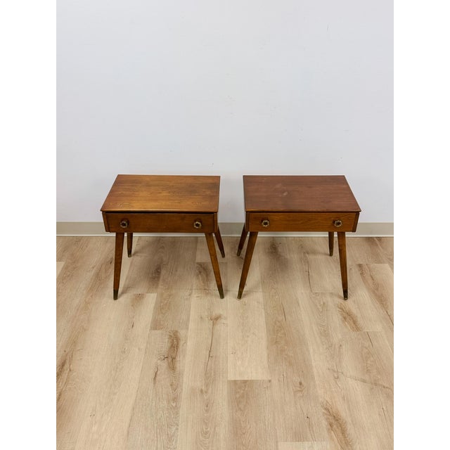 This fun and characterful pair of vintage atomic MCM nightstands are a playful and distinctive mid-century modern bedroom...