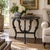 A handsome Victorian side table crafted in walnut and painted in antiqued black. The elegant carved legs create a piece...