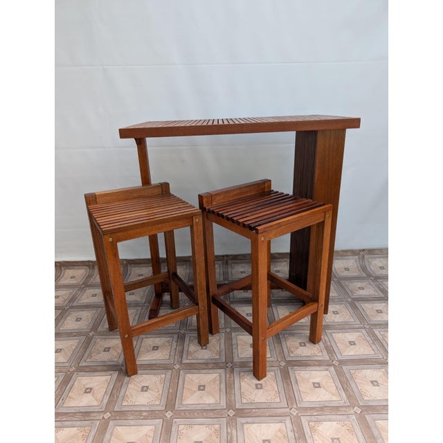 Bar furniture set made of exotic teak wood Solid and durable construction. Teak furniture set consisting of a bar table...