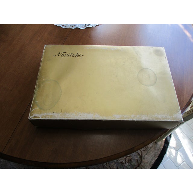 This product is a vintage 1971 Noritake flatware table service set that includes 76 pieces with a serenade pattern and a...