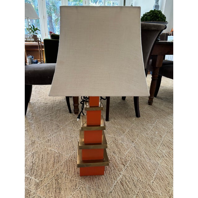 This orange & brass Pagoda Lamp will add pizazz to any room. The lamp features a three way switch with fabric covered...