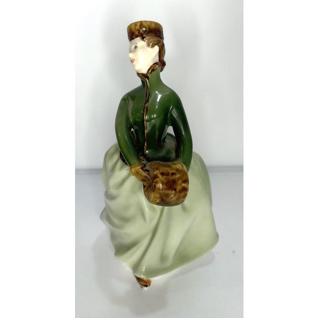Royal Doulton figurine that captures a moment in time with this lovely ice skater. This skater, created by M Nicoll and...