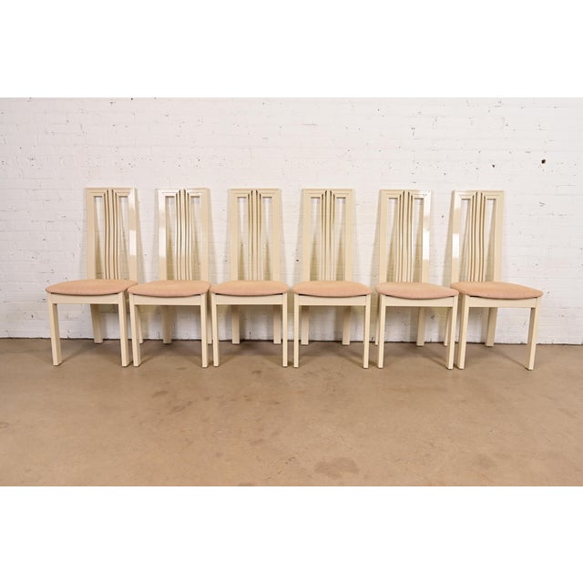 A sleek and stylish set of six Italian Modern or Postmodern slatted high back dining chairs In the manner of Pietro...